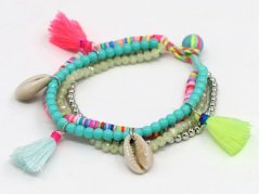 Colorful bracelet with beads, shells and fringes